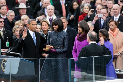 Supreme Court Chief Justice John G. Roberts, Jr. administers the oath of office to President Barack Obama during the inaugural swearing-in ceremony at the U.S. Capitol in Washington, D.C., Jan. 21, 2013. First Lady Michelle Obama holds a Bible that belonged to Dr. Martin Luther King Jr., and the Lincoln Bible, which was used at President ObamaÕs 2009 inaugural ceremony. Daughters Sasha and Malia stand with their parents.  (Official White House Photo by Sonya N. Hebert)